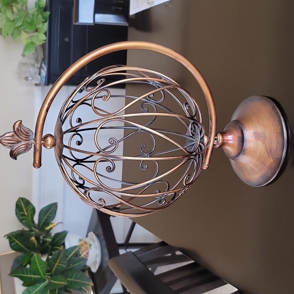 Metal Copper Sphere Home Decor swivels with base.